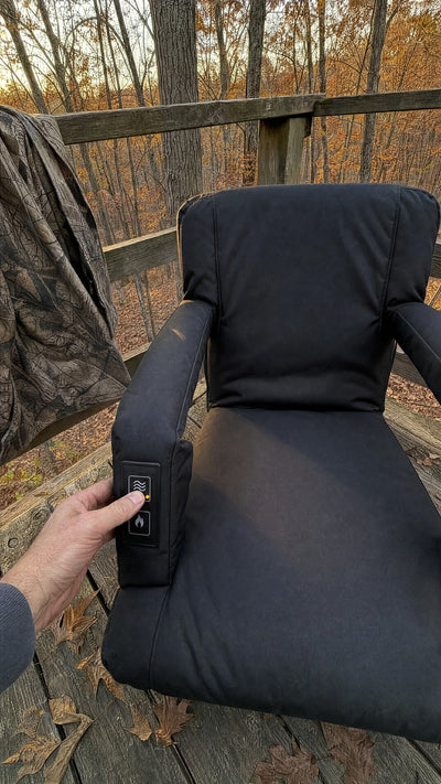 HuddleWarm heat and massage controller on the armrest